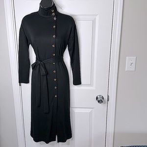 Black never look so good in this tight fitted dress will make a BOSS statement!